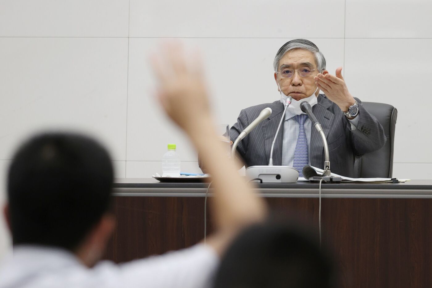 Haruhiko Kuroda, governor of the Bank of Japan (BOJ), takes questions during a news conference at the central bank's headquarters in Tokyo, Japan, on Tuesday, June 16, 2020. Kuroda said interest rates would likely remain ultralow into 2023 and warned that the pandemic could end up having a longer-than-expected impact on the economy.