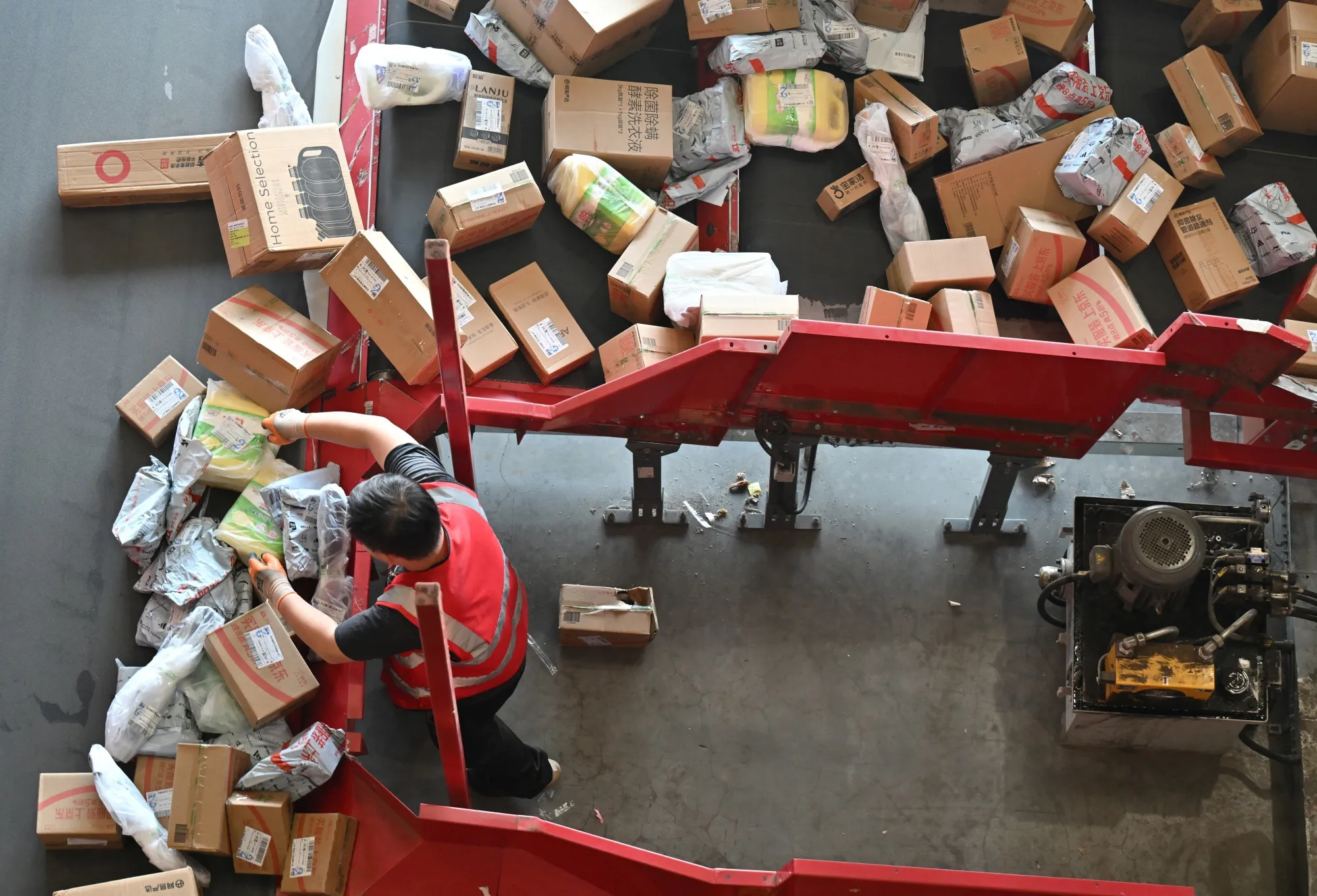 A worker sorts packages at JD’s warehouse during Singles’s Day in Beijing on Nov. 11.