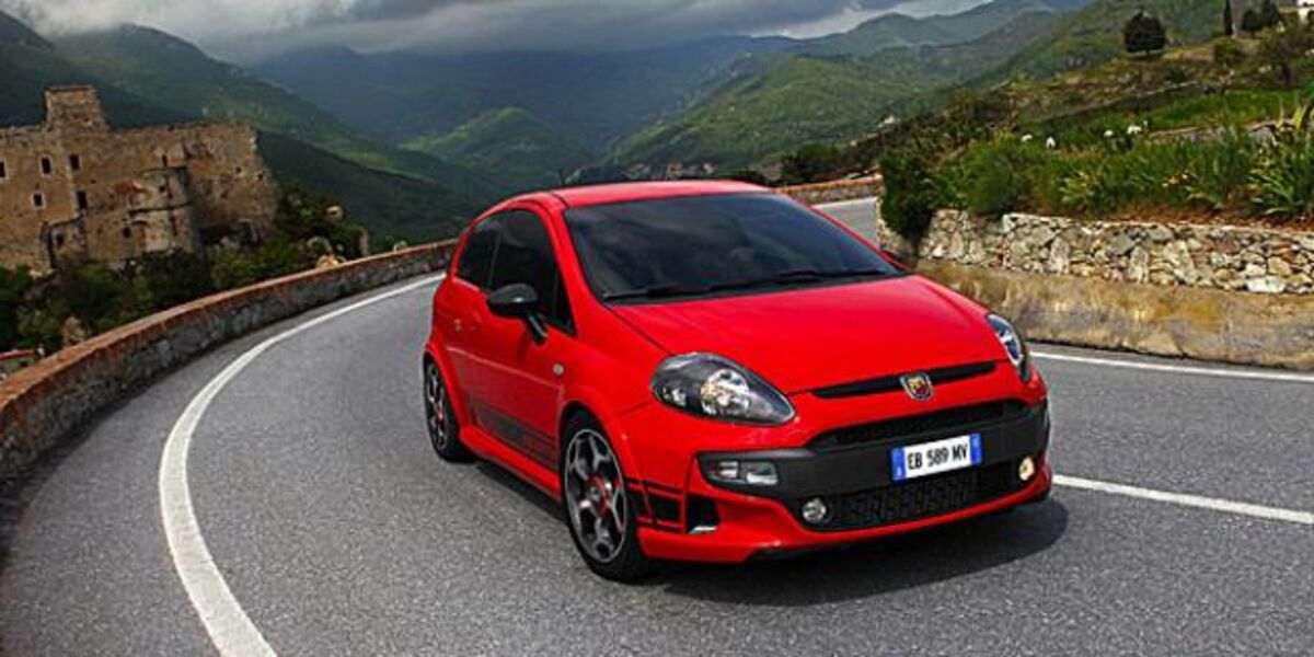 Old Red Fiat Punto Fourdoors Parked Editorial Stock Image - Image