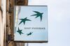A BNP Paribas SA logo is seen outside a bank branch in Paris, France, on Wednesday, Feb. 15, 2012. BNP Paribas SA, France's largest bank, reported fourth-quarter profit that beat analysts estimates and said its corporate-and investment-banking unit had a 'good start' to the year.