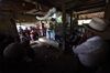 Neighbors and relatives attend the wake for 7-year old Jakelin Caal, who died in a Texas hospital.