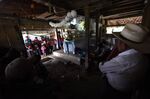 Neighbors and relatives attend the wake for 7-year old Jakelin Caal, who died in a Texas hospital.