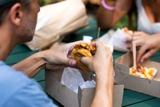 Customers dine at  Shake Shack restaurant in New York.