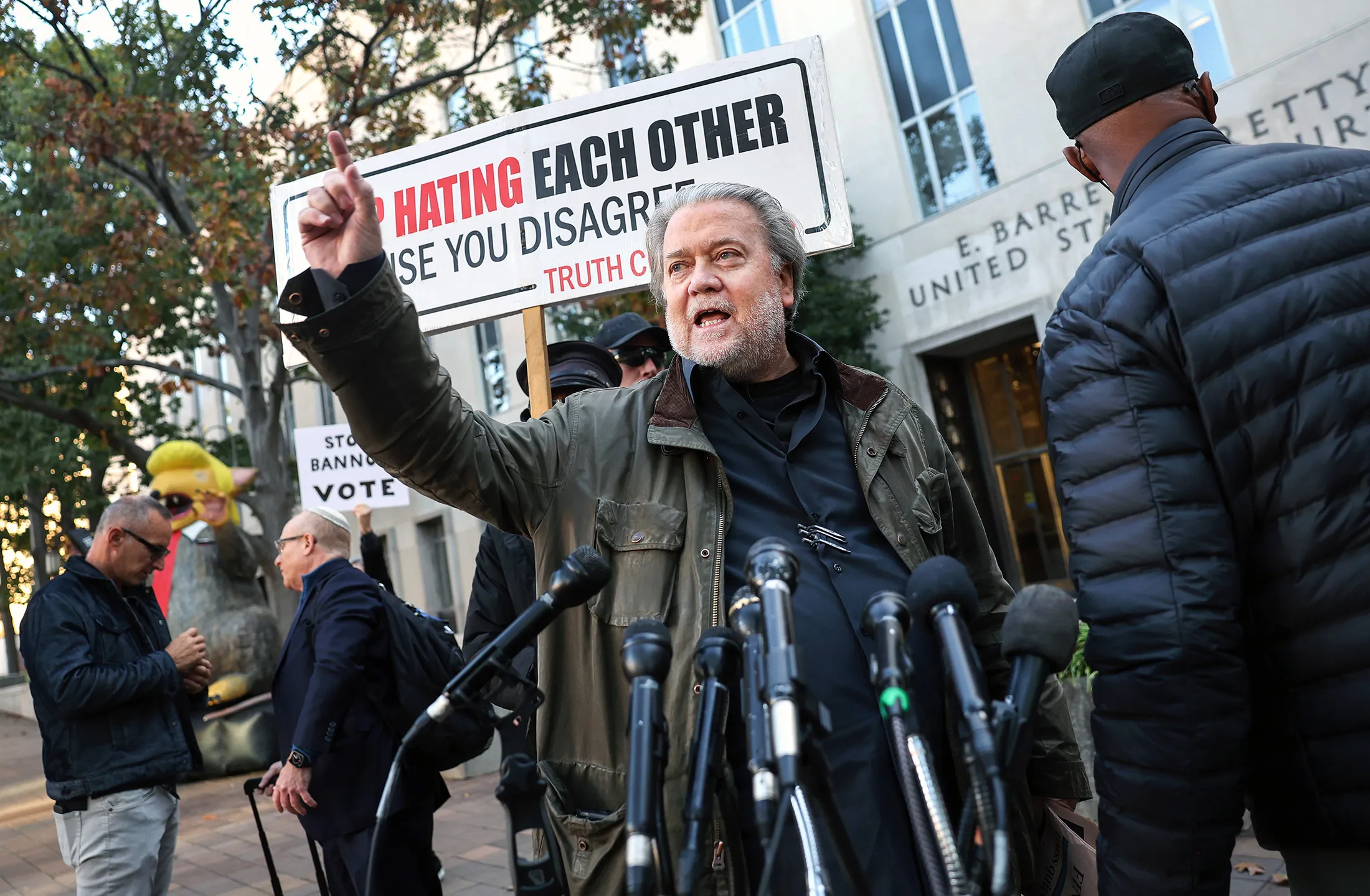 Steve Bannon speaks to the media as he arrives to be sentenced at federal court in Washington, DC, on Oct. 21.