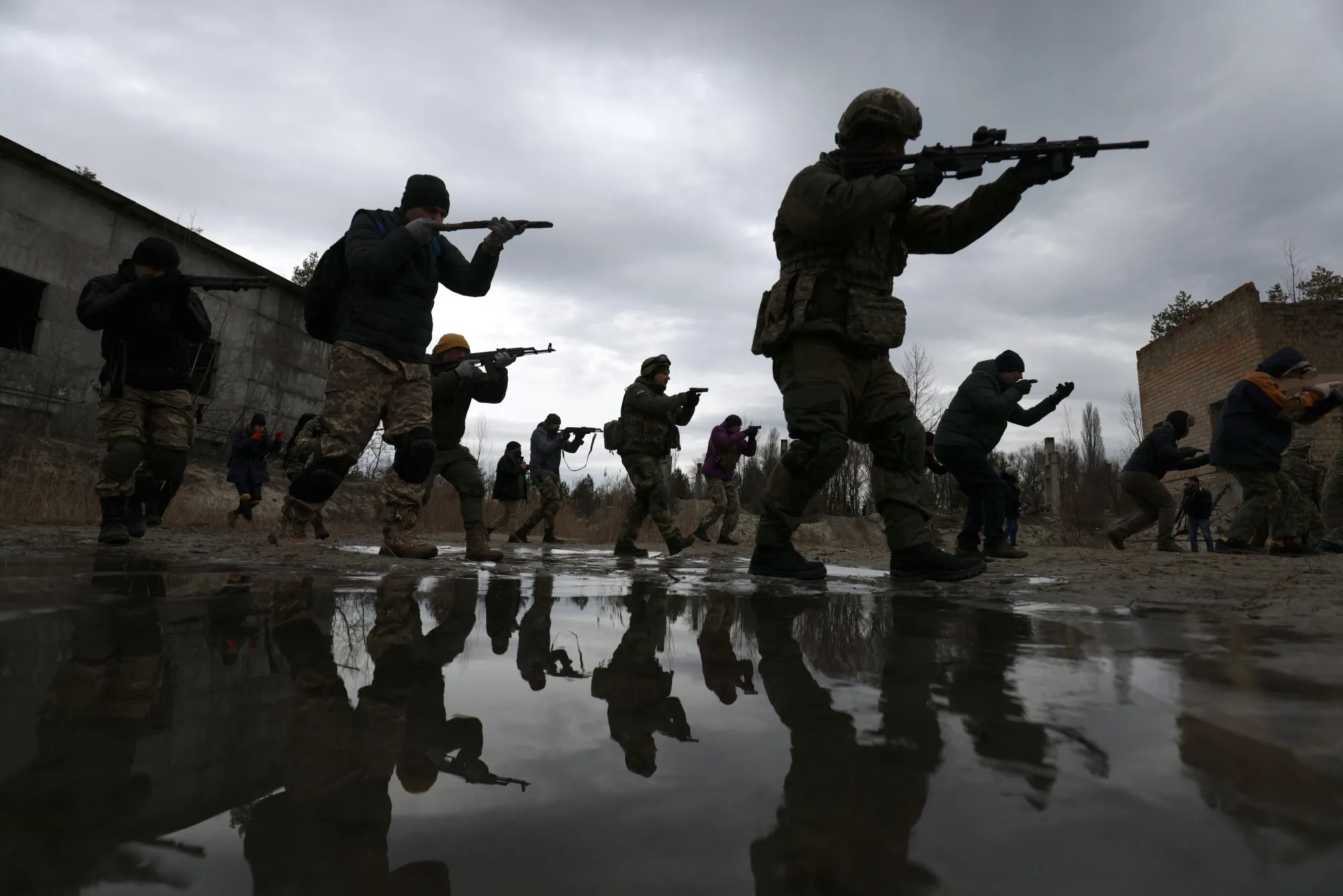 Members of Ukraine's Territorial Defense Forces participate in a drill during training on the outskirts of Kyiv, Ukraine, on Feb. 19.