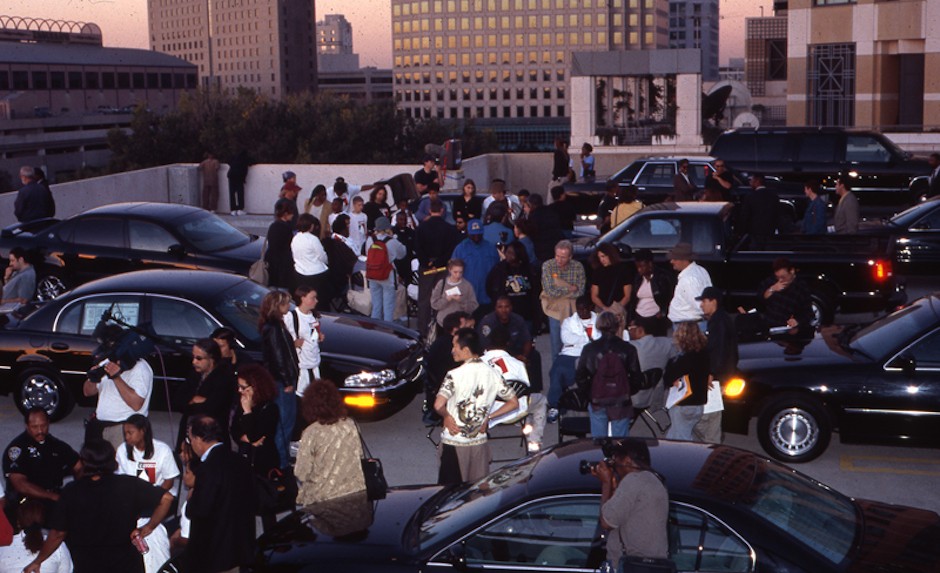 As part of Suzanne Lacy's 1990s Oakland Projects, kids and cops engage in candid conversations on a rooftop.