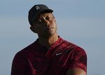 Tiger Woods gestures during the trophy ceremony of the Hero World Challenge PGA Tour at the Albany Golf Club, in New Providence, Bahamas, Sunday, Dec. 5, 2021.(AP Photo/Fernando Llano)