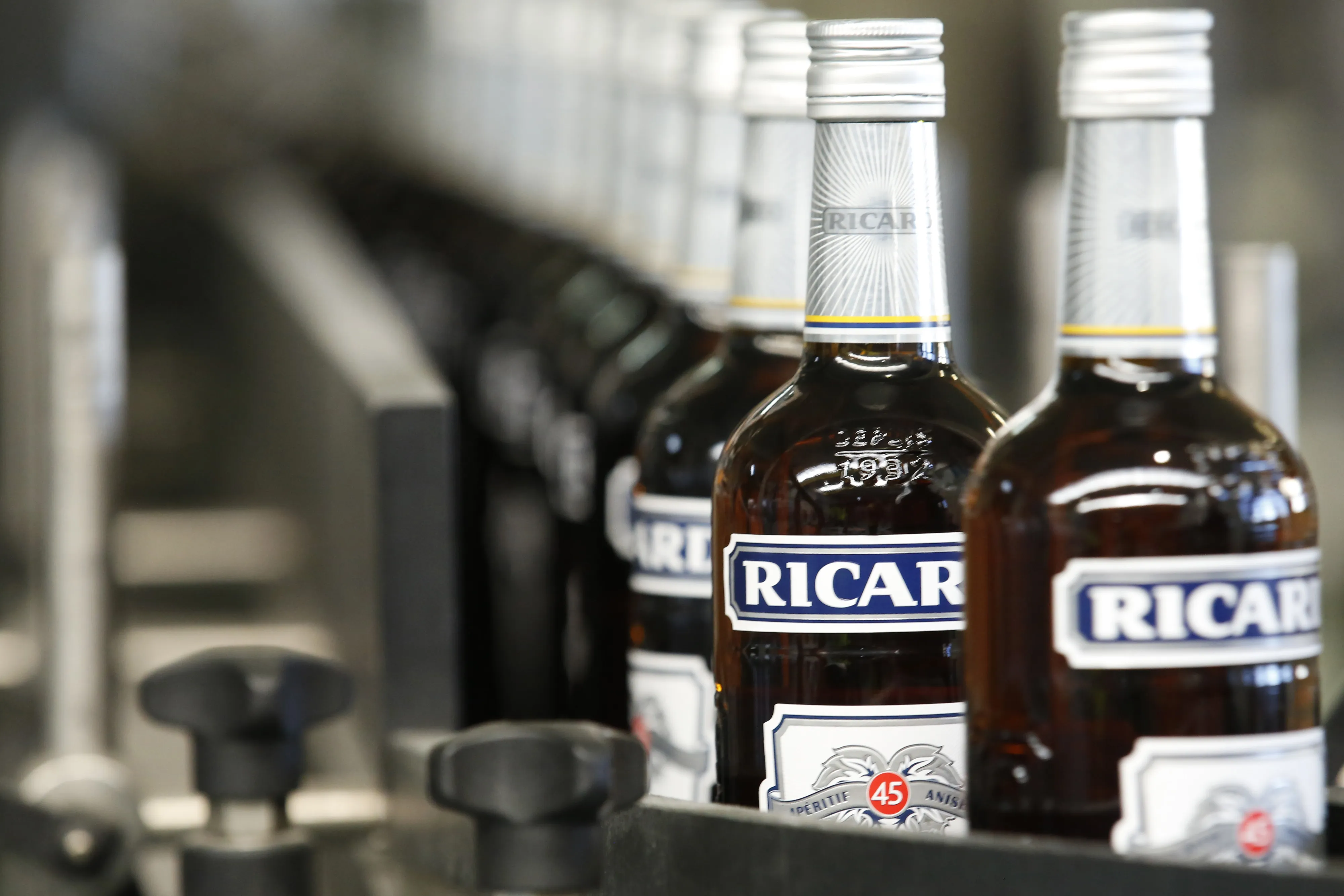 A line of&nbsp;Pernod Ricard bottles at the company’s alcoholic beverage plant and warehouse in Vendeville, France.