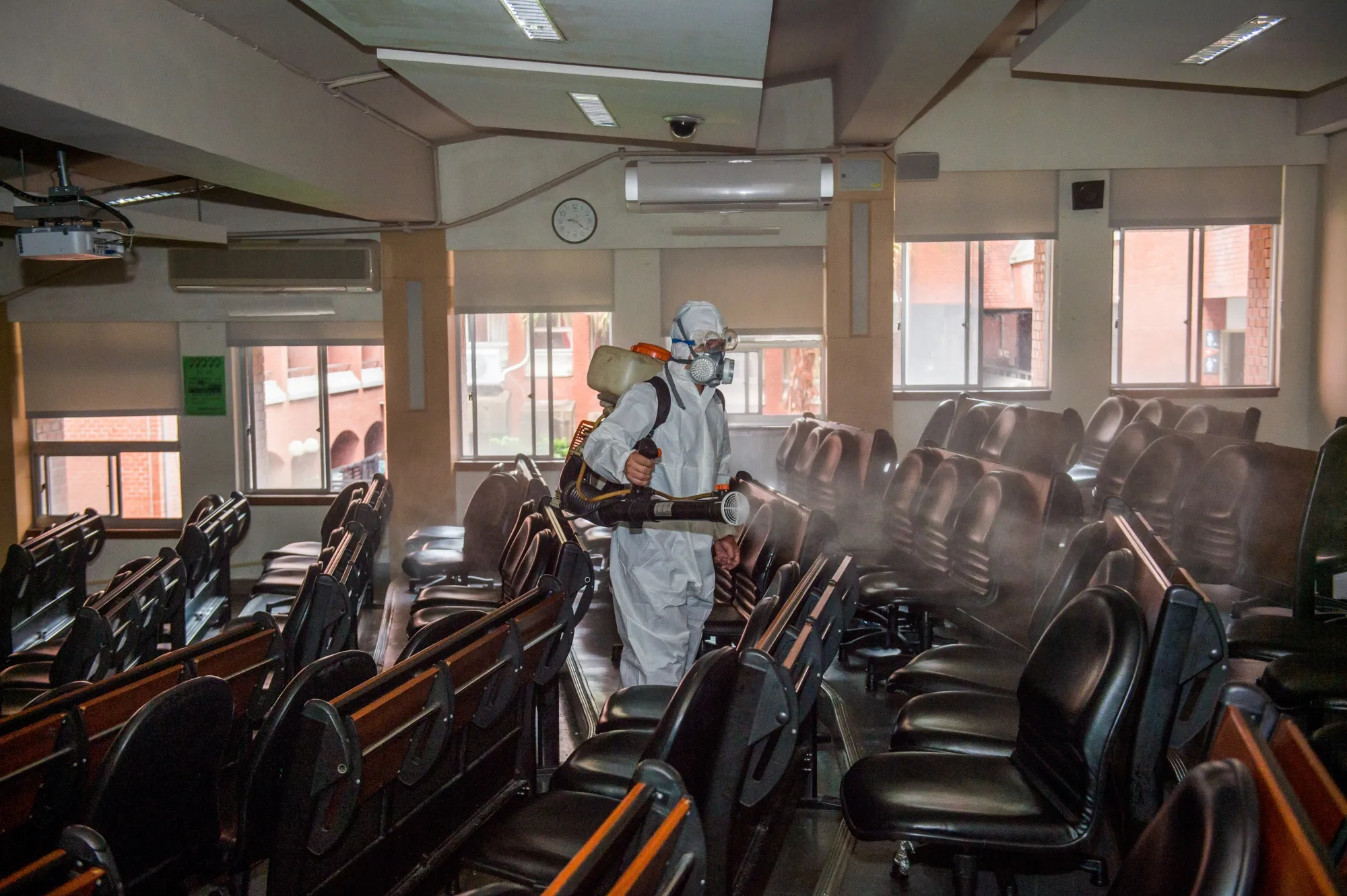 A health worker sprays disinfectants at the National Taiwan Normal University on April 17.