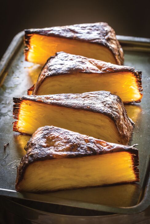 Olympia Provisions' Laser Potatoes, sliced up like a glorious, savory cake.