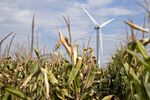 A wind turbine stand on property used by the Alliant Energy Corp. Whispering Willow Wind Farm in Iowa Falls, Iowa, U.S., on Thursday, Sept. 15, 2016. Wind energy, the fastest-growing source of electricity in the U.S., is transforming low-income rural areas in ways not seen since the federal government gave land to homesteaders 150 years ago.
