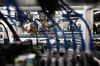 Power supply units and cooling fans sit on shelves at a cryptocurrency mining facility in Incheon, South Korea, on Friday, Dec. 15, 2017. Hedge funds are pulling out of gold bets as more exciting moves in equities and cryptocurrencies make safe-haven investments look boring.