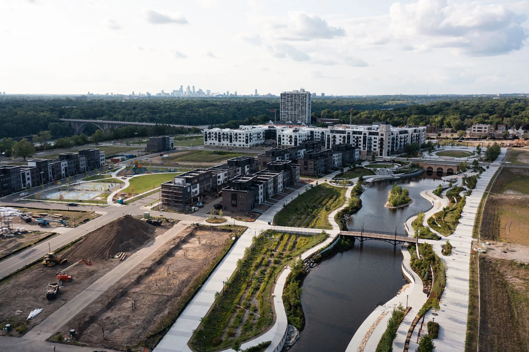 A mixed-use development, with 20% of the housing reserved for lower-income renters, under construction on a 122-acre site where a Ford Motor Co. assembly plant once stood along the Mississippi River in St. Paul, Minnesota, part of the Twin Cities metropolitan area