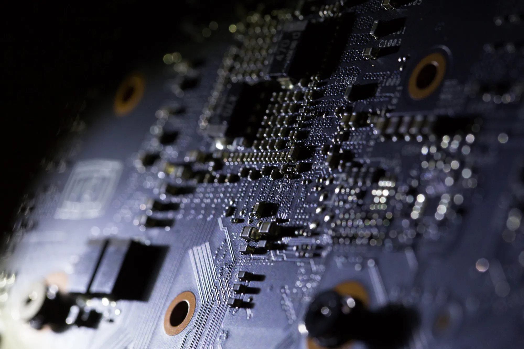 Computer chips sit on a motherboard.