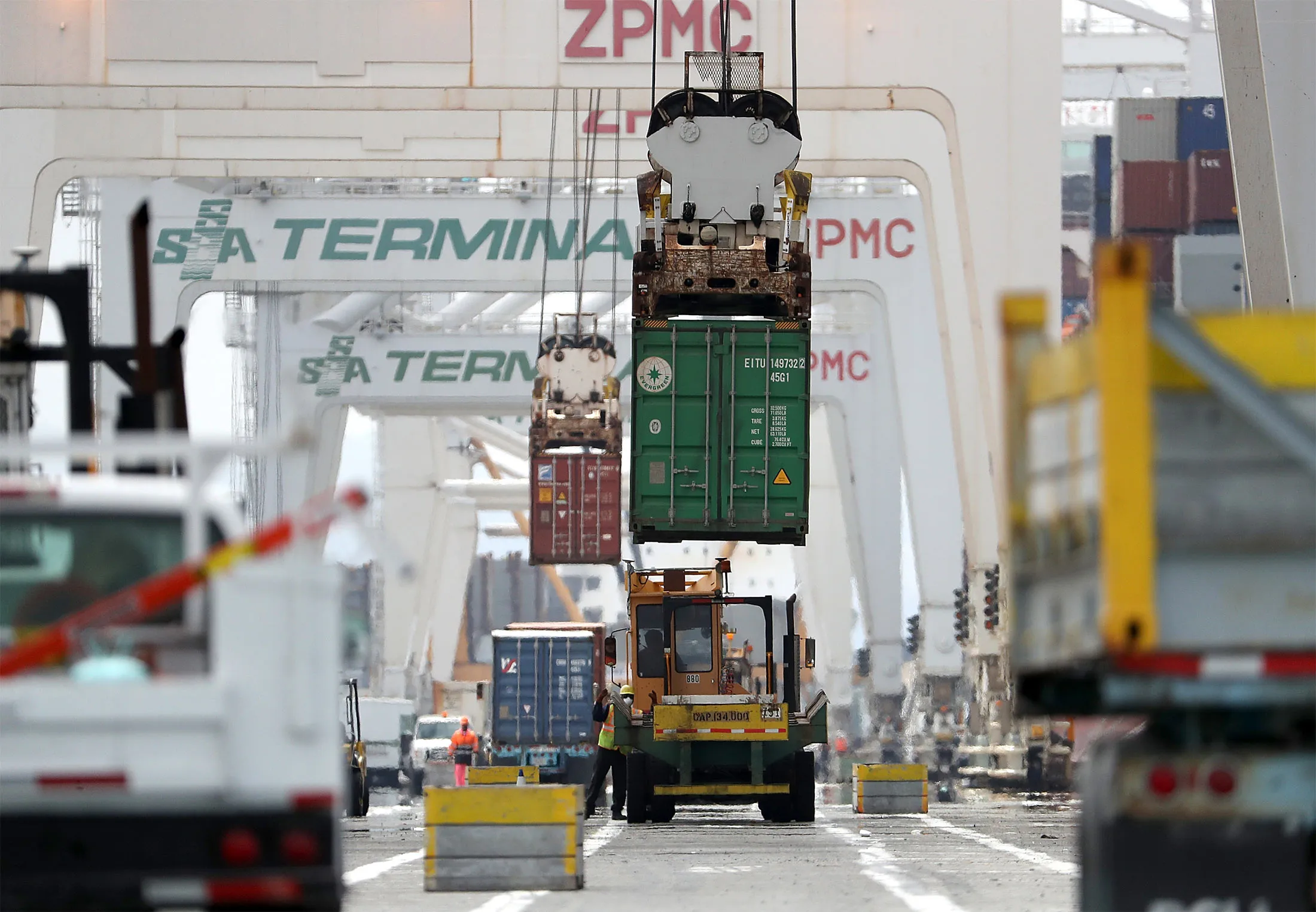 A shipping container is offloaded at the Port of Oakland, California.
