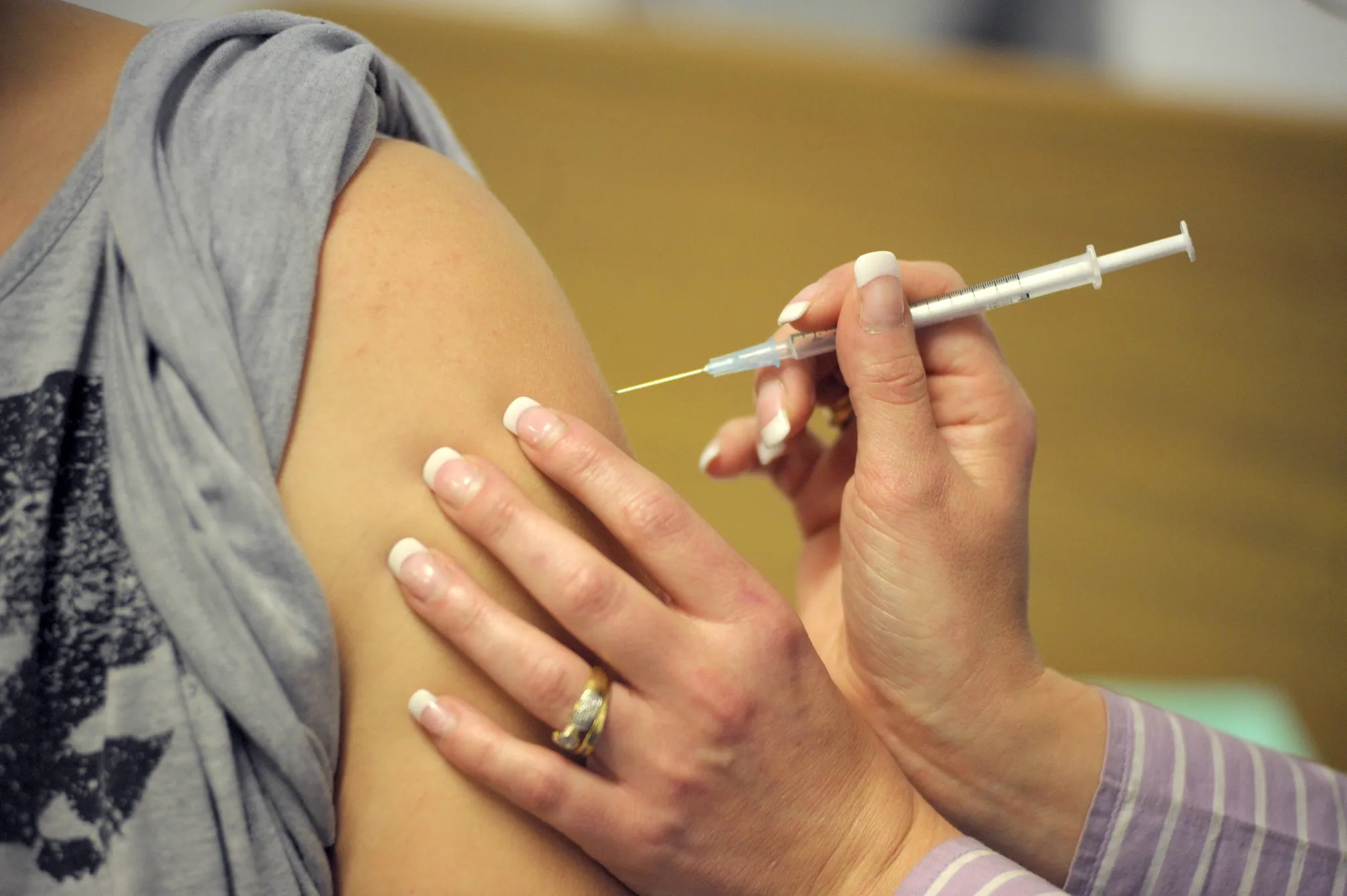 A patient receives a vaccine produced by CSL Ltd.&nbsp;in Adelaide, Australia.