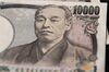 Japanese 10,000 yen banknotes are arranged for a photograph in Tokyo, Japan on Sunday April 14, 2019. U.S. Treasury Secretary Steven Mnuchin said he wanted a currency clause in a trade deal with Japan to prevent deliberate manipulation of the yen to bolster exports, Japanese public broadcaster NHK said.