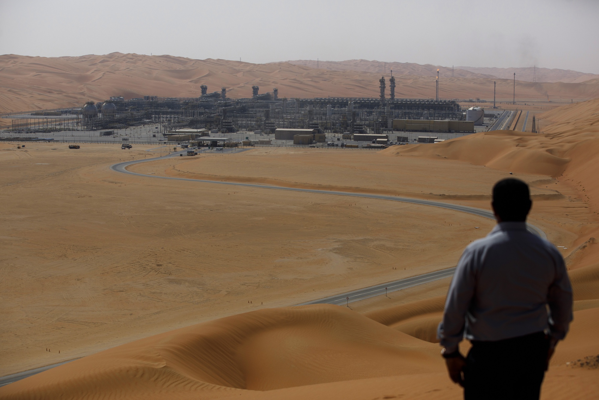 An employee looks out over the Natural Gas Liquids facility in Saudi Aramco's Shaybah oilfield.