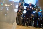 Traders work on the floor of the New York Stock Exchange
