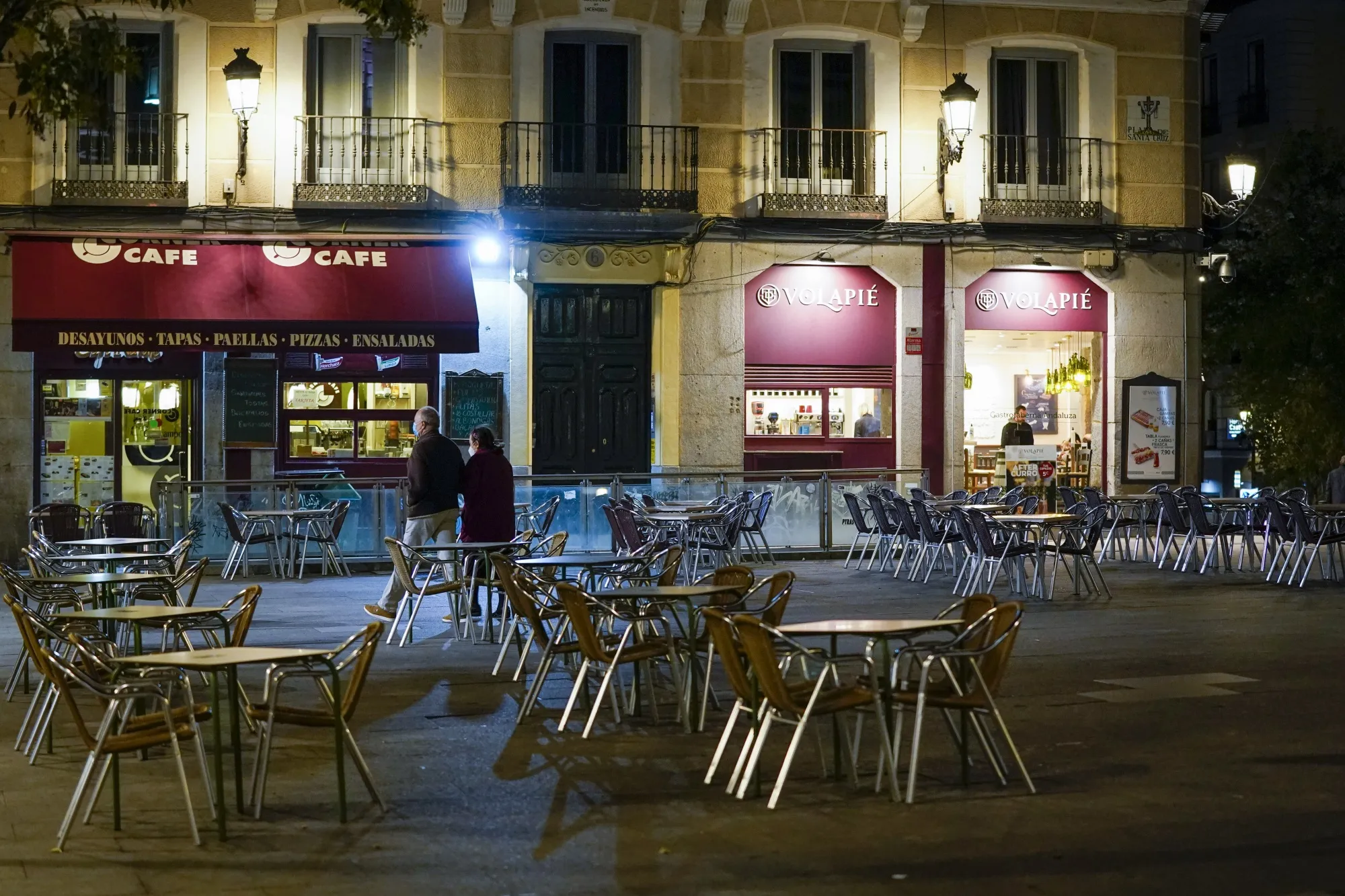 Empty tables stand outside cafes in Madrid,&nbsp;on&nbsp;Oct. 2.&nbsp;