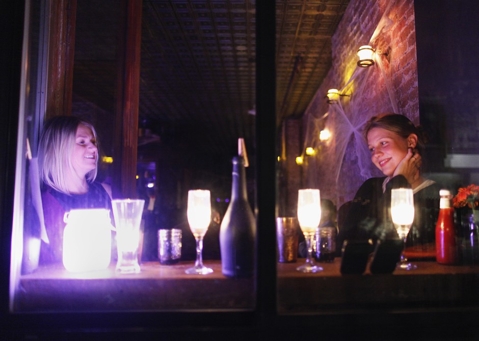 Women at a bar in Manhattan's East Village. A new study finds that a greater number of bars and restaurants corresponds with higher levels of innovation.