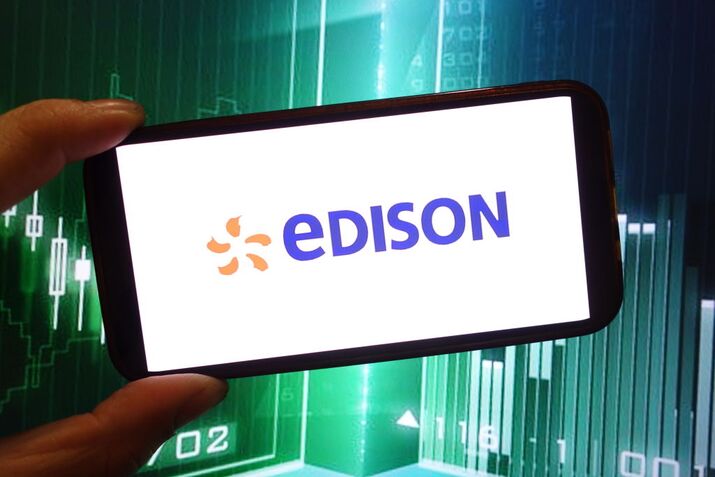 In this photo illustration, the Edison S.p.A. company logo