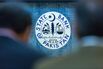 The emblem of the State Bank of Pakistan.