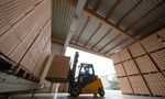 A worker uses a forklift truck to sort bricks in&nbsp;a storage facility at the Wienerberger AG brickmaking plant in Haiding, Austria.