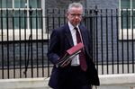 Michael Gove leaves after attending the first cabinet meeting under the new Prime Minister, Rishi Sunak. 