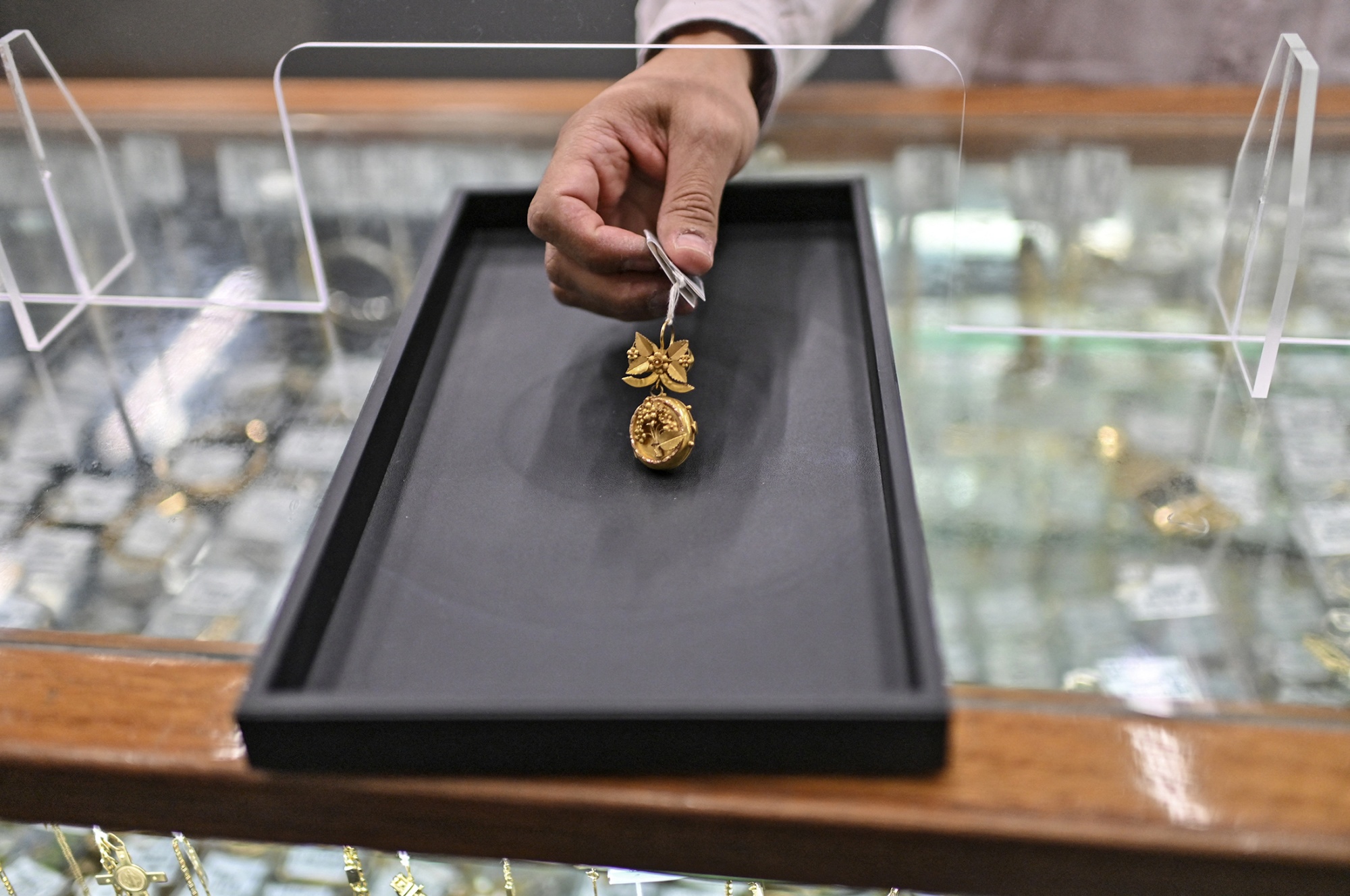 Jewelry being displayed at a pawn shop.