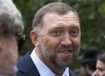 In this July 2, 2015, file photo, Russian metals magnate Oleg Deripaska attends Independence Day celebrations at Spaso House, the residence of the American Ambassador, in Moscow, Russia. Russia’s war on Ukraine has sent shockwaves through the elite global community of wealthy Russians. Some have begun, tentatively, to speak out. Deripaska, Alfa Bank founder Mikhail Fridman and banker Oleg Tinkov have also urged an end to the violence, though none has directly mentioned Putin. (AP Photo/Alexander Zemlianichenko, File)