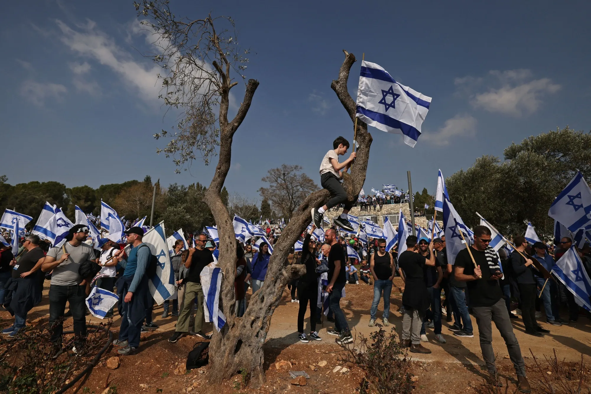 People protest against the government's judicial reform bill near the Knesset in Jerusalem.