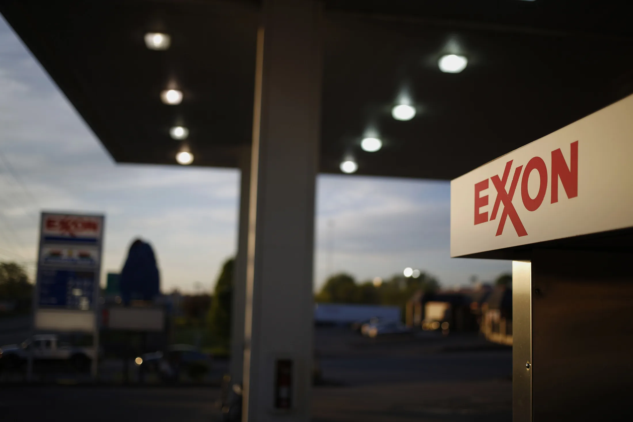 Exxon Mobil Corp. signage is displayed on a fuel pump at a gas station in Richmond, Kentucky.
