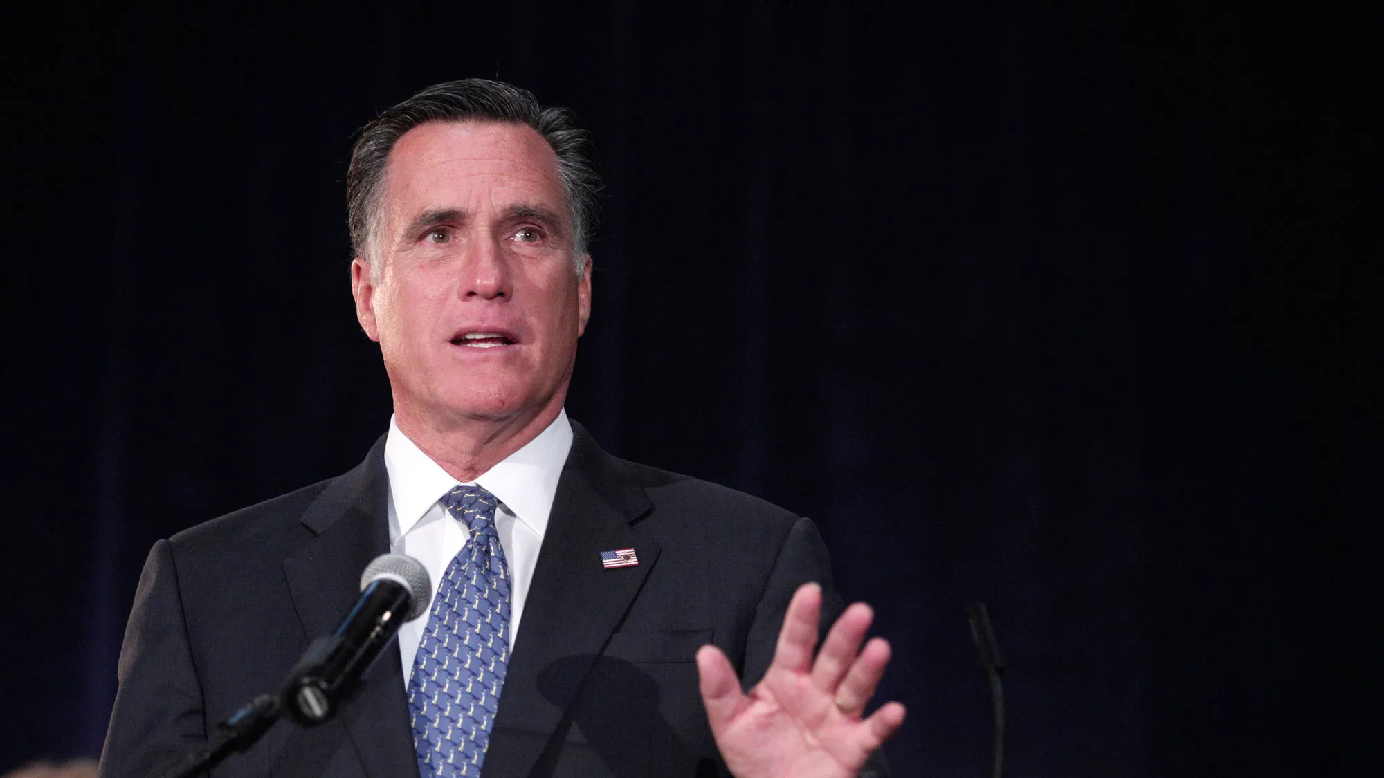 Former Republican presidential candidate and former Massachusetts Governor Mitt Romney, delivers remarks during a 'CoMITT to the Comeback' rally for Michigan republican candidates October 2, 2014 in Livonia, Michigan.
