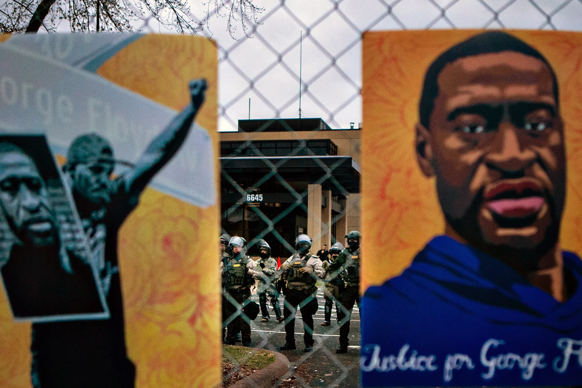 Protesters gather outside the Brooklyn Center Police Department calling for justice for Daunte Wright