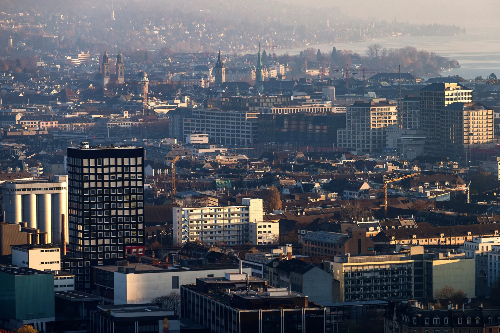 Commercial and residential properties stand on the city skyline in Zurich, Switzerland.
