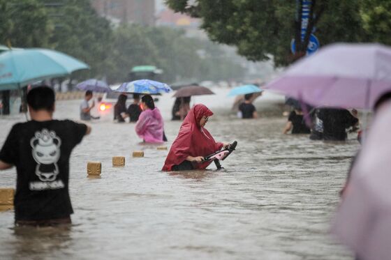 China’s ‘iPhone City’ Relocates 100,000 After Floods Leave 12 Dead
