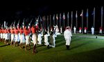 An honour guard fires a gun salute during the Beating of the Retreat ceremony at the end of the Pacific Islands Forum.