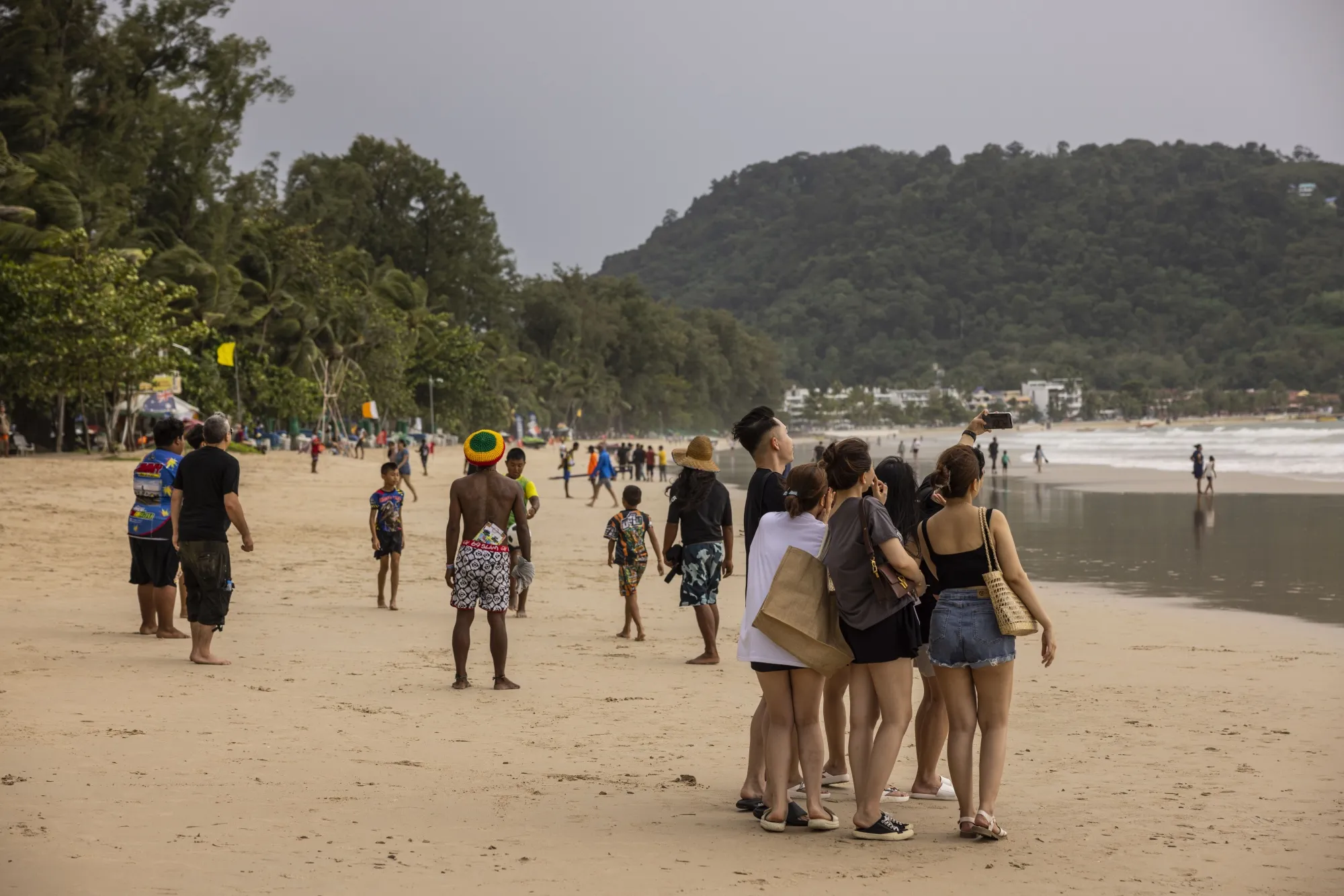 Tourists on Patong Beach in Phuket.
