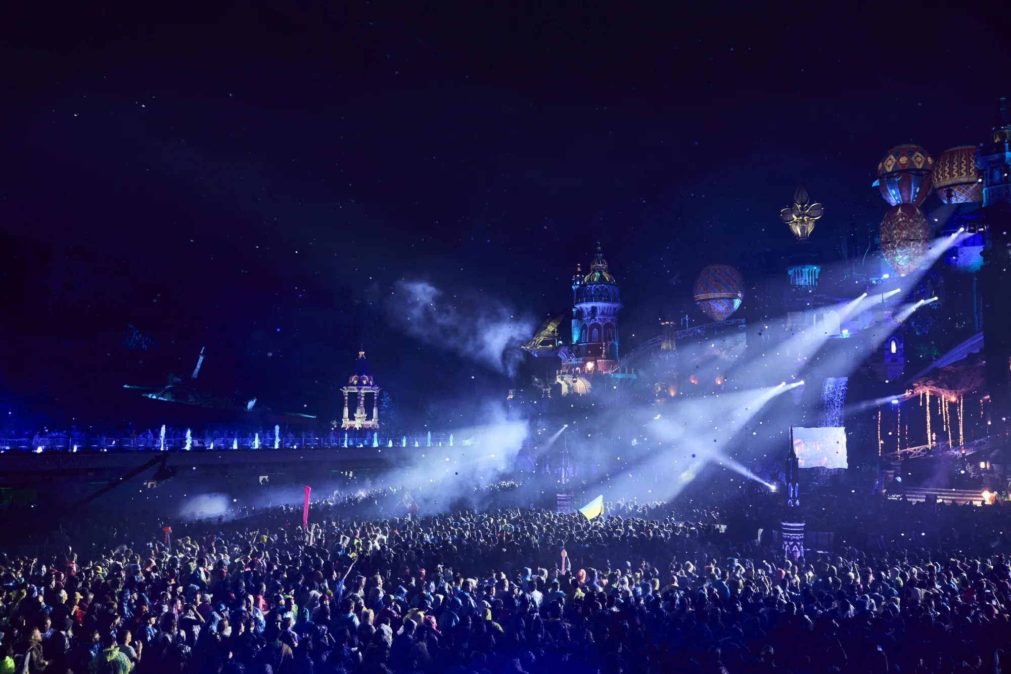 Festival goers at the main stage during the performance of musician Paul Kalkbrenner at the Tomorrowland electronic dance music festival at De Schorre provincial recreational park in Boom, Belgium, on July 30, 2023.