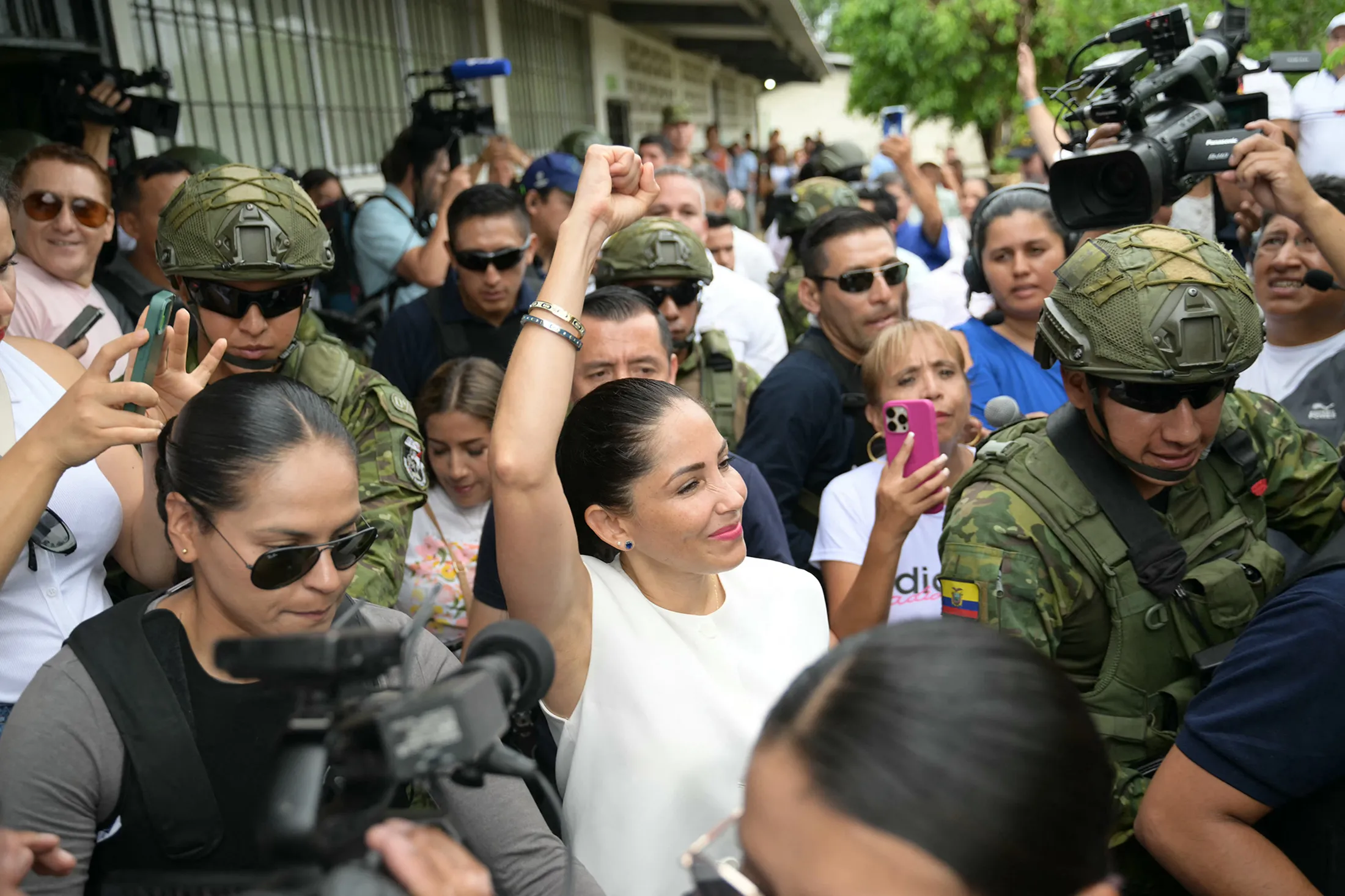 Luisa González, center, departs after voting at a polling station in Canuto, Ecuador, on Feb. 9, 2025.