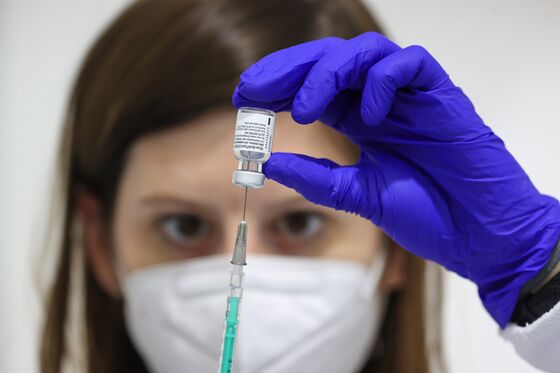 Merkel’s Hand Prints Are All Over Germany’s Vaccine Failings