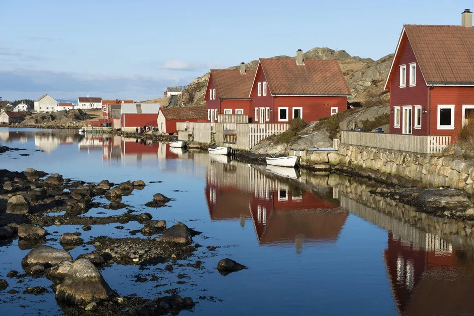Holiday cottages on the fjord, near Egersund, Rogaland, Norway.
