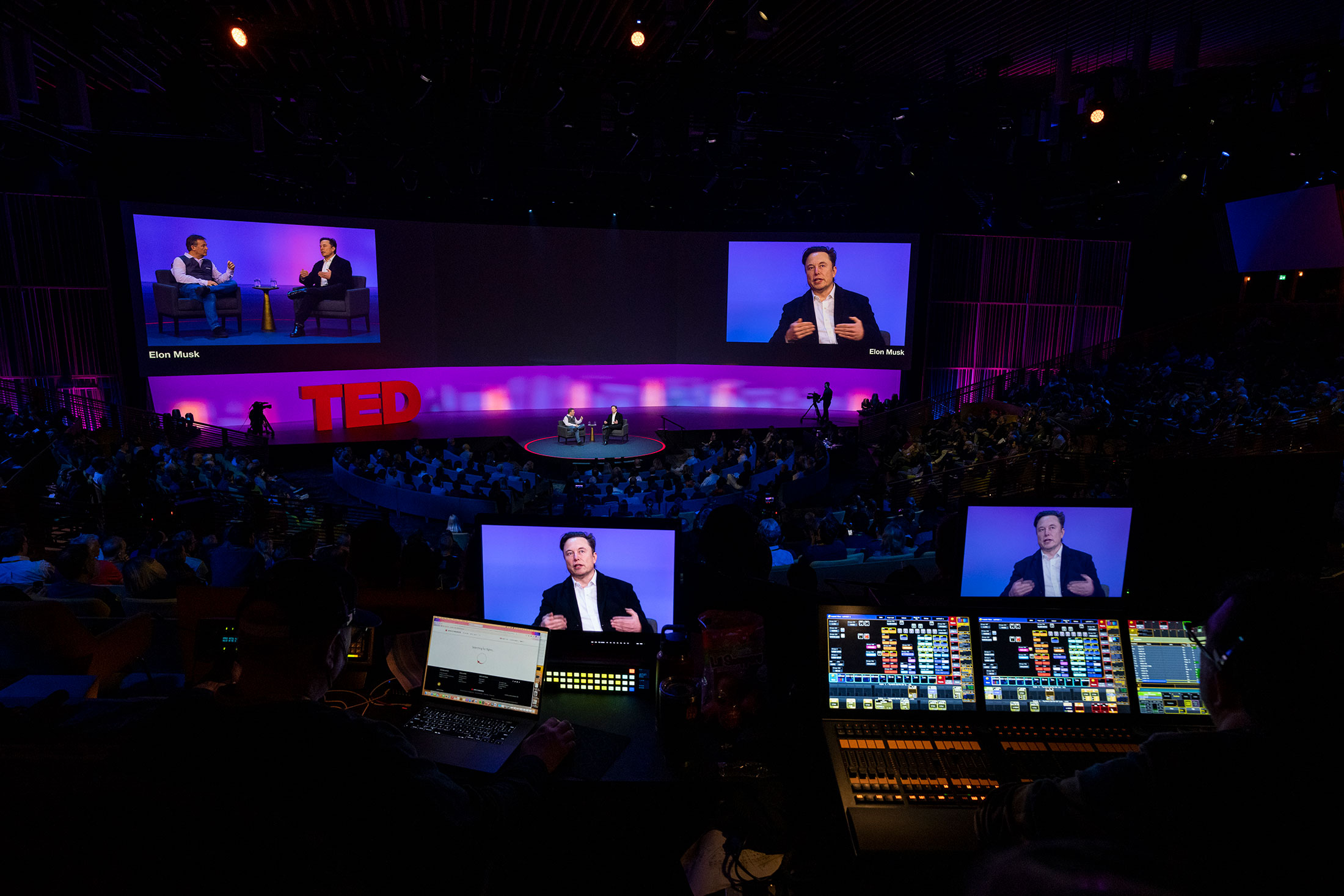 Elon Musk on stage at TED