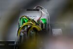 Cables are attached to an application-specific integrated circuit (ASIC) device and power unit, manufactured by Bitmain Technologies Inc.