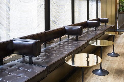 Custom bronze Tulip tables by Eero Saarinen: One sold for more than $36,000.