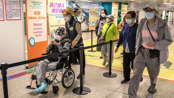 Shanghai Cases Hit Record; Firms Leave Hong Kong: Virus Update