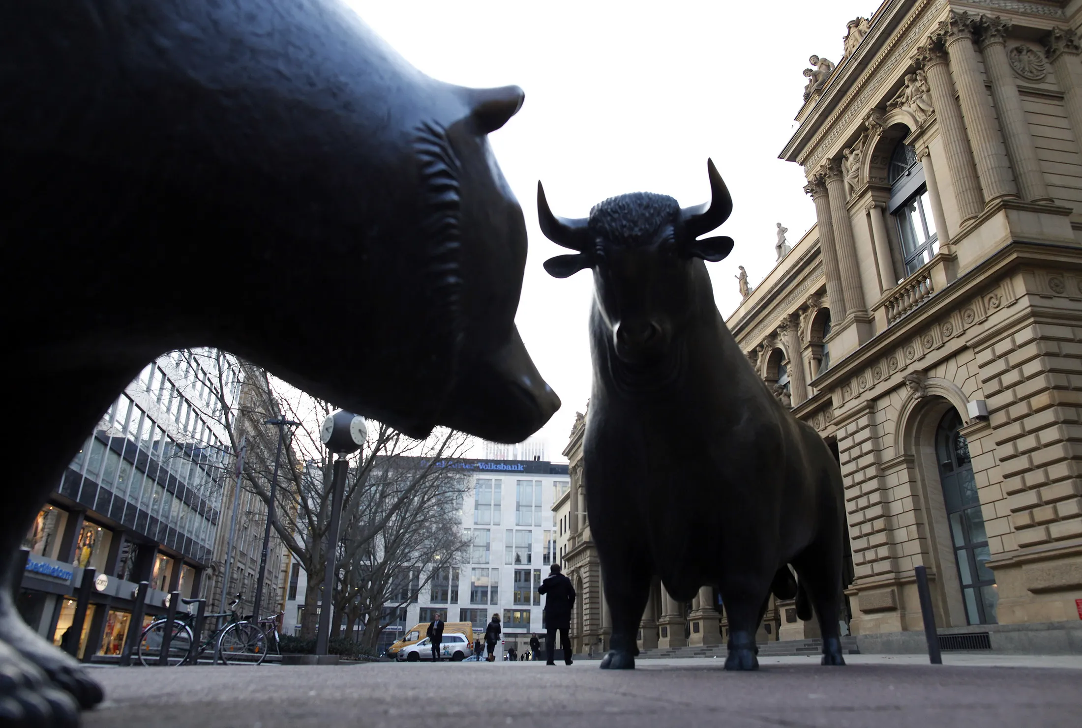 A bull and a bear statue stand outside the Frankfurt Stock Exchange in Frankfurt, Germany
