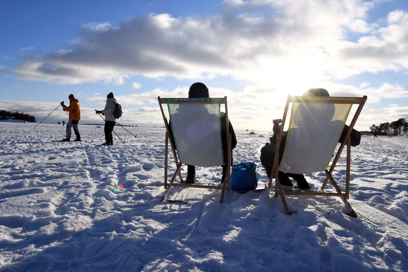 People enjoy sunny weather on the waterfront in Helsinki.&nbsp;