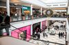 Shoppers walk through the King of Prussia mall in King of Prussia, Pennsylvania, U.S., on Saturday, Oct. 20, 2018. Stiffening competition, surging online advertising costs and cheap mall space have prompted online brands to embrace what they call "offline" in a big way. In their push to become retail's next household names they're venturing beyond the coasts and major cities into suburban America.